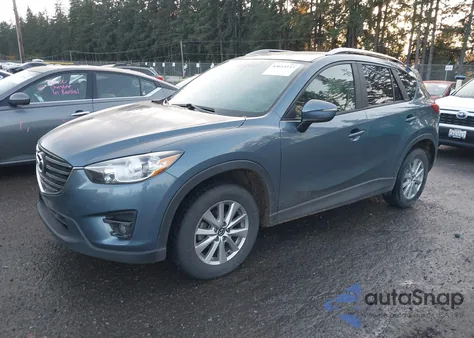 2016 Mazda Cx-5 Touring from USA, damaged, VIN JM3KE4CY1G0885510